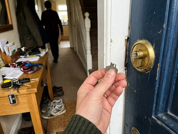 Broken key with the blade still in the lock